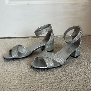 Kid’s size 3 silver heels.